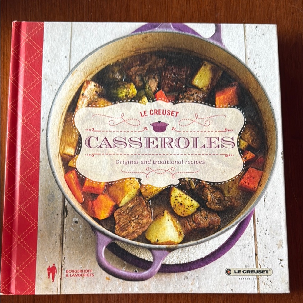 Le Creuset Casseroles Cookbook with Red and Brown Accents